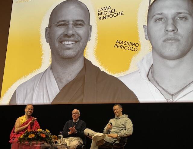 iI confronto tra il lama michel rinpoche e il rupper Massimo Pericolo